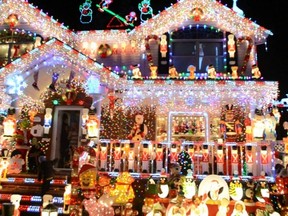 Elaborate, energy-sucking Christmas-light displays such as this should be banned, no matter how much joy and cheer they bring to our lives because they are destroying the planet.
(RASHER.COM)