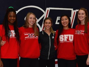 SFU head women’s basketball coach Bruce Langford calls his 2015-16 recruiting class of (left to right) Ozi Nwabuko, Jessica Jones, Tayler Drynan, Tia Tsang and Claudia Hart his most talented ever. Nwabuko, Jones and Hart will all play in the fourth annual Tsumura Basketball Invitational beginning Thursday in Langley. (Photo — SFU athletics)