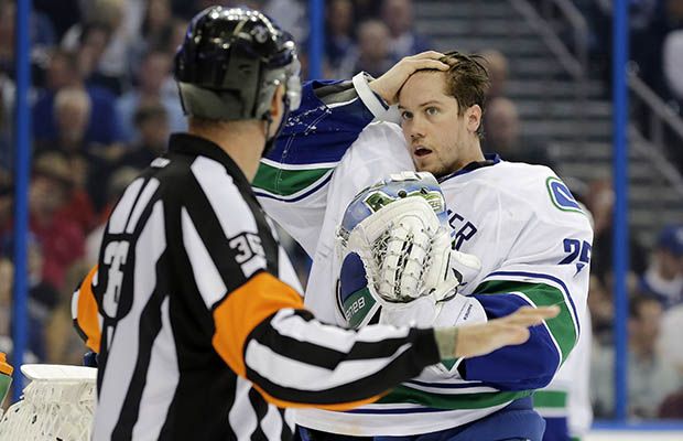 Canucks goalie Jacob Markstrom complains to a referee about being hit after the whistle last night in Tampa. Markstrom was not penalized on the play.