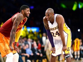 Kobe Bryant  (right) and Paul George (left) have been two of the league's biggest surprises thus far but for two completely different reasons. (Photo by Kevork Djansezian/Getty Images)