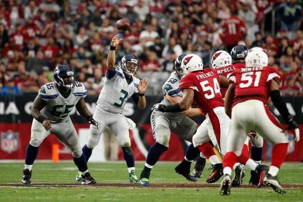 GLENDALE, AZ - JANUARY 03: Quarterback Russell Wilson #3 of the Seattle Seahawks makes a pass in the first half of the NFL game against the Arizona Cardinals at the University of Phoenix Stadium on January 3, 2016 in Glendale, Arizona. (Photo by Christian Petersen/Getty Images)