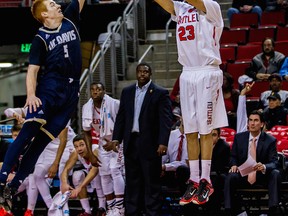 Seattle University Redhawks’ Manroop Clair, a former Burnaby South star, is on fire from three-point land these days. Here, he hits one of his six treys from a Dec. 28 contest against visiting UC-Davis at KeyArena. (Mike Centioli, Seattle University athletics)