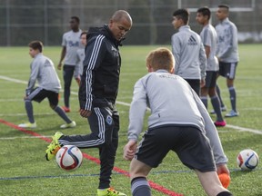 Former Whitecaps player Robert Earnshaw during a soccer drill as he starts his first day as the head coach for the Whitecaps Residency U-14s, Jan. 28, 2016. Gerry Kahrmann/PNG