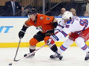 Emerson Etem (right) battles Anaheim's Cam Fowler for the puck during a December game in New York City.