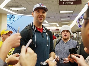 Yes, kids, that's John Scott — of the St. John's IceCaps — arriving in Nashville for the NHL All-Star Game. The league might be a bit embarrassed, but we're kinda happy about it. (Bruce Bennett/Getty Images)
