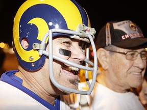 A couple of Rams fans celebrate their team's return to Los Angeles when it was announced earlier this month.