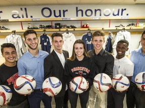 Whitecaps FC youth players (from left): Cole Morokohovich, Vana Markarian, Luciano Trasolini, Olivia Sheppard, Frazer Poulter, Daniel Sagno and Andre Baires all signed on to NCAA soccer futures last week. (Steve Bosch / PNG staff photo)