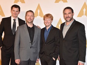 Special effects supervisor Cameron Waldbauer (left) with (L-R) Jason Smith, animation supervisor Matt Shumway and visual effects supervisor Richard McBride attend the 88th Annual Academy Awards nominee luncheon on Feb. 8 in Beverly Hills. Waldbauer and his team are nominated for an Oscar for The Revenant starring Leonardo DiCaprio.  (Kevin Winter/Getty Images files)