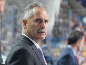 The Canucks are struggling, but how much is the coach to blame?  (Photo by Bill Wippert/NHLI via Getty Images)