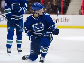 Thrown jerseys and blown leads: Canucks' early struggles test fans