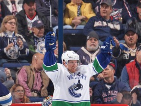 Henrik Sedin, reacting here after scoring a goal during the third period of a game against the Columbus Blue Jackets on November 10, 2015 at Nationwide Arena in Columbus, is expected to return to the Canucks' line-up tonight after missing four games with an upper body injury. (Photo by Jamie Sabau/NHLI via Getty Images)