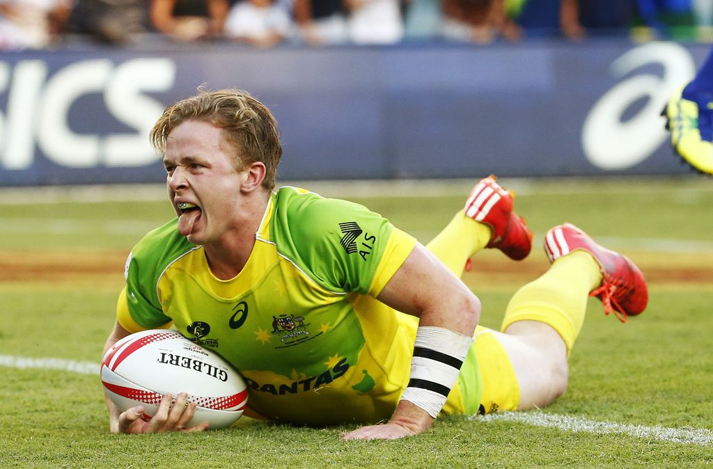 SYDNEY, AUSTRALIA - FEBRUARY 07:  Henry Hutchison of Australia scores a try during the 20146 Sydney Sevens final match between Australia and New Zealand at Allianz Stadium on February 7, 2016 in Sydney, Australia.  (Photo by Daniel Munoz/Getty Images)