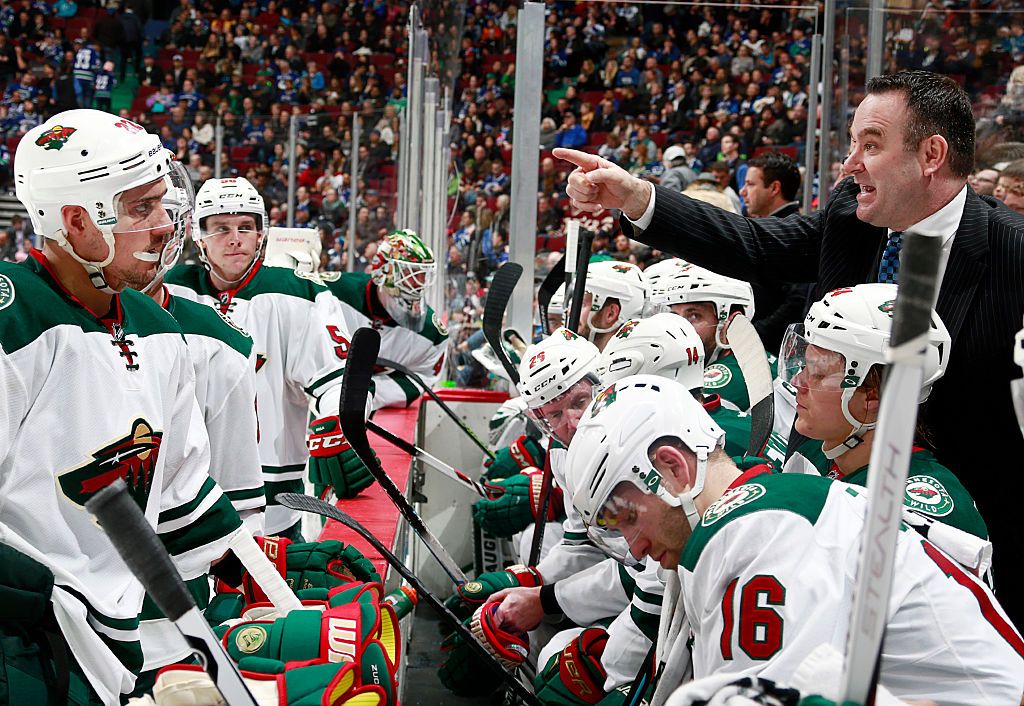 VANCOUVER, BC - FEBRUARY 15: John Torchetti provides instruction during his first game as head coach of the Minnesota Wild during the NHL game against the Vancouver Canucks at Rogers Arena February 15, 2016 in Vancouver, British Columbia, Canada. Minnesota won 5-2. (Photo by Jeff Vinnick/NHLI via Getty Images)