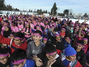 Hundreds of students from Princess Margaret Secondary School and three nearby elementary schools got together for Pink Shirt Day celebrations in 2014. The event continues to grow in B.C. and across the country.  (Jason Payne, PNG files)