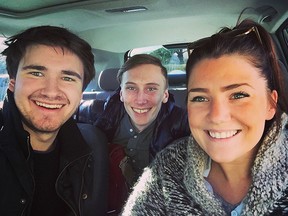 Josh Andrews (left), and Kristoffer Vik Hansen (middle), two of the creators of Spare Rides app with Becca Koole, who has signed up as a driver with the carpooling app.