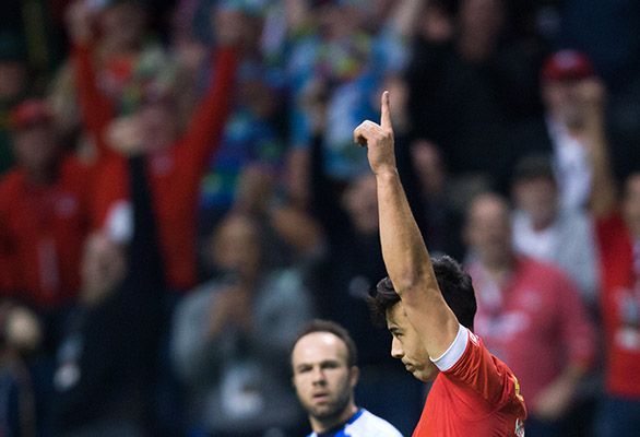 Canada's Nathan Hirayama celebrates after kicking a conversion to defeat Australia during World Rugby Sevens Series' Canada Sevens tournament action, in Vancouver, B.C., on Saturday, March 12, 2016. THE CANADIAN PRESS/Darryl Dyck