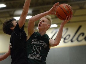 Walnut Grove's Brett Christensen leads his team in battle against Kelowna in the TBI final. (PNG photo by Howard Tsumura)