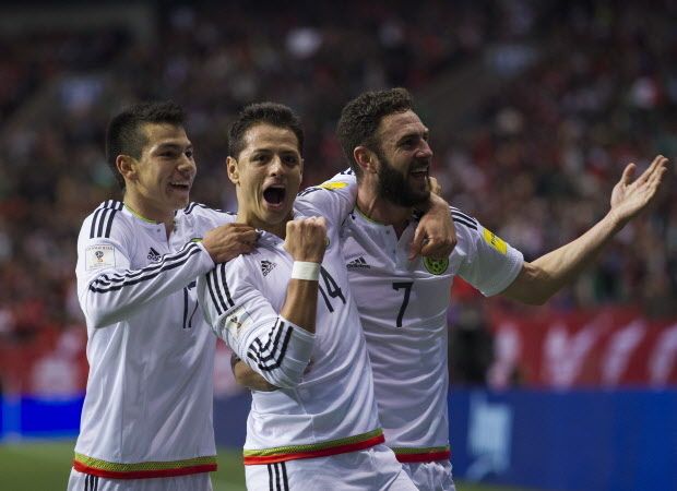 Hirving Lozano, #14 Javier Hernandez and #7 Miguel Layun celebrate their first goal against Canada in a FIFA World Cup soccer qualifier at BC Place, Vancouver March 25 2016. Gerry Kahrmann / PNG staff photo)