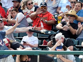 A kid at the Pirates-Braves spring training game yesterday at Walt Disney World owes his dad a beer. Hey kid, see if you can order on your phone.