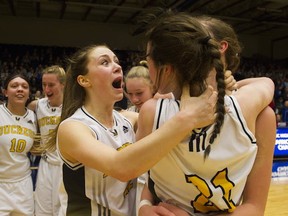 Duchess Park Condors' Nicole Erricson can't hide the jubilation that came with winning a B.C. Double A hoops title Saturday at the PEC. (Gerry Kahrmann, The Province)