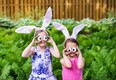 Girls Wearing Bunny Ears and Silly Egg Eyes - Close Up