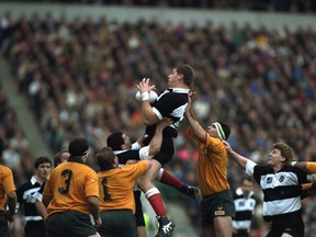 28 Nov 1992:  Norm Hadley (centre high) of the Barbarians is helped with his jump to win the ball during the match against Australia at Twickenham in London. Australia won the match 30-20. (Chris  Cole/Allsport)