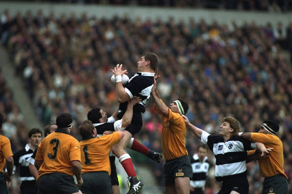 28 Nov 1992: Norm Hadley (centre high) of the Barbarians is helped with his jump to win the ball during the match against Australia at Twickenham in London. Australia won the match 30-20. (Chris Cole/Allsport)