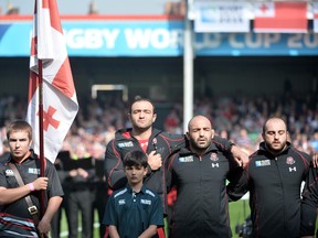 Georgia's number 8 and captain Mamuka Gorgodze lines up with teammates prior to   a Pool C match of the 2015 Rugby World Cup between Tonga and Georgia at Kingsholm Stadium in Gloucester. (BERTRAND LANGLOIS/AFP/Getty Images)