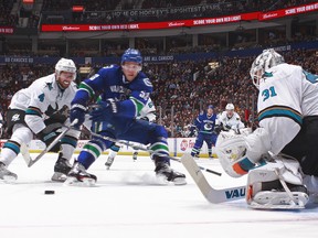 Canucks forward Bo Horvat drives to the net vs. the Sharks on Thursday. (Photo by Jeff Vinnick/NHLI via Getty Images)