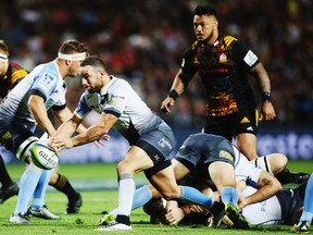 Look carefully, kids. That's not a ruck, that's just a tackle.  (Photo by Hannah Peters/Getty Images)