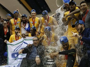 The Ryerson Rams celebrate win over Carleton and school's first-ever OUA championship. Next: UBC In the opening round of the Final 8 on Thursday. (Toronto Sun photo)