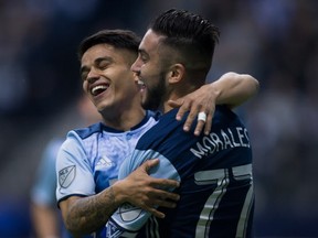 No joy: Pedro Morales won't be celebrating goals with Cristian Techera for a while. THE CANADIAN PRESS/Darryl Dyck