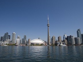 The classic middle finger towers over the Toronto skyline. (National Post files)
