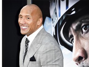 Actor Dwayne Johnson attends the premiere of Warner Bros. Pictures’ “San Andreas,” May 26, 2015 at TCL Chinese Theatre in Hollywood, California.