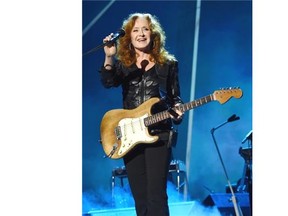 Musician Bonnie Raitt performs onstage at the 25th anniversary MusiCares 2015 Person Of The Year Gala honoring Bob Dylan at the Los Angeles Convention Center on February 6, 2015 in Los Angeles, California. The annual benefit raises critical funds for MusiCares' Emergency Financial Assistance and Addiction Recovery programs. For more information visit musicares.org.  (Photo by Larry Busacca/Getty Images for NARAS)