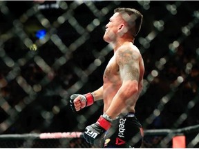 Anthony Pettis celebrates after defeating Gilbert Menendez in a Dec. 6, 2014, lightweight title fight at UFC 181 Las Vegas.