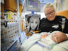 Baby Sal Smaaslet with his great aunt Rose Horan-Pachota at Surrey Memorial Hospital in a photo taken March 10.     Mark van Manen/PNG