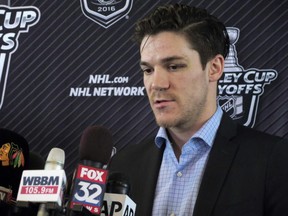 Chicago Blackhawks forward Andrew Shaw talks to reporters before the team left for St. Louis on Wednesday, April 20, 2016, at Chicago's O'Hare International Airport.  Blackhawks forward Andrew Shaw apologized Wednesday for yelling an anti-gay slur at someone on the ice after he was sent to the penalty box late in Chicago's Game 4 loss at home to the St. Louis Blues.  (AP Photo/Carrie Antlfinger)
