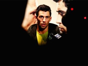 Dominick Cruz answers questions from the media after his workout at UFC Gym on January 15, 2016 in Boston, Massachusetts.