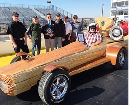 Bryan Reid Sr., founder and owner of Pioneer Log Homes in Williams Lake and star of HGTV’s Timber Kings, helped build the ‘Cedar Rocket’ log car. The Cedar Rocket set the Guinness World Record for the ‘world’s fastest motorized log’ at the quarter-mile track at Wild Horse Pass last month in Chandler, Ariz. The car will be auctioned off next year and all proceeds will be donated to veterans’ charities. — Pioneer Log Homes of B.C.