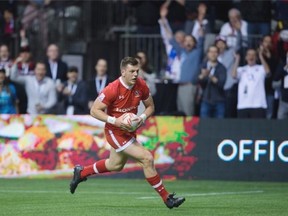 Canada’s Adam Zaruba runs for the game-winning try against Australia during World Rugby Sevens Series’ Canada Sevens tournament action, in Vancouver, B.C., on Saturday, March 12, 2016.