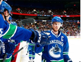 Canucks general manager Jim Benning says he's well aware the value of Henrik Sedin and his brother Daniel goes well beyond their ability to score. He calls them the team's "culture carriers."