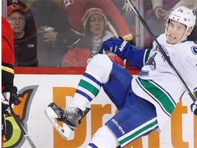 Canucks winger Adam Cracknell is knocked off his skates. Cracknell, a 30-year-old, has been identified as one of the players available for trade, a list that also includes Dan Hamhuis, Radim Vrbata,    Linden Vey, Matt Bartkowski, Ronalds Kenins, Chris Higgins, Brandon Prust and Yannick Weber.