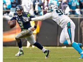 Carolina all-pro defensive lineman Kawann Short pressures Seattle quarterback Russell Wilson in Sunday’s NFC Divisional Playoff Game at in Charlotte, N.C.  — Getty Images