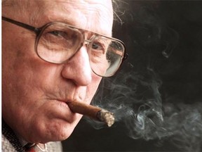 Jim Coleman, photographed in 1996 with his ever-present cigar.