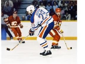 OIL COUNTRY / Wednesday January 14, 2009 Page H8 
 Oilers defenceman Don Jackson tries to break up a pass to Hakan Loob of the Flames in NHL action in the early 1980s. / file date June 11, 1985 / original date unknown 
 Edmonton Oiler player Don Jackson skates in the eighties.