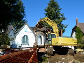 Construction unions leader says asbestos is being released during demolition of old homes. (PNG FILES)