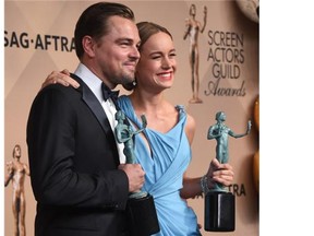 Leonardo Dicaprio (L), winner of Outstanding Performance by a Male Actor in a Leading Role; and Brie Larson, winner of Outstanding Performance by a Female Actor in a Leading Role pose in the press room at the 22nd Annual Screen Actors Guild Awards at The Shrine Auditorium on January 30, 2016 in Los Angeles, California.