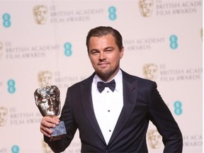 Actor Leonardo Di Caprio with his Best Actor award for his role in the film 'The Revenant' backstage at the BAFTA 2016 film awards at the Royal Opera House in London, Sunday, Feb. 14, 2016