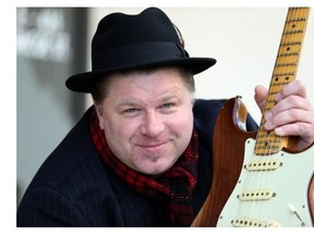 Victoria bluesman Jason Buie with his recently returned 1973 Fender Stratocaster. Over the years, the guitar has been signed by Buddy Guy, Otis Rush, Albert Collins, Robert Cray, Jimmy Vaughn and Paul Rodgers.